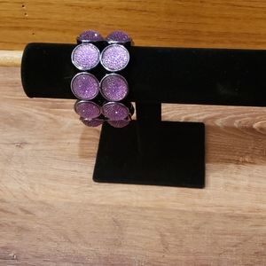 Stretchy purple bracelet.